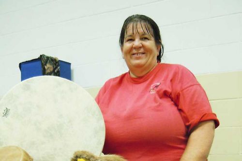 Member of the Shabot Obaadjiwan First Nation, Judi Montgomery of Napanee, was selling an assortment of her ceremonial regalia along with the decorative moccasins that she taught in a workshop earlier this year in Sharbot Lake